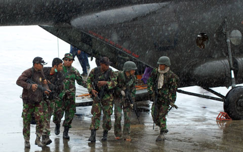 Troops in Tingginambut after being shot at in helicopter by TPN, Feb 24 (Photo: TNI)